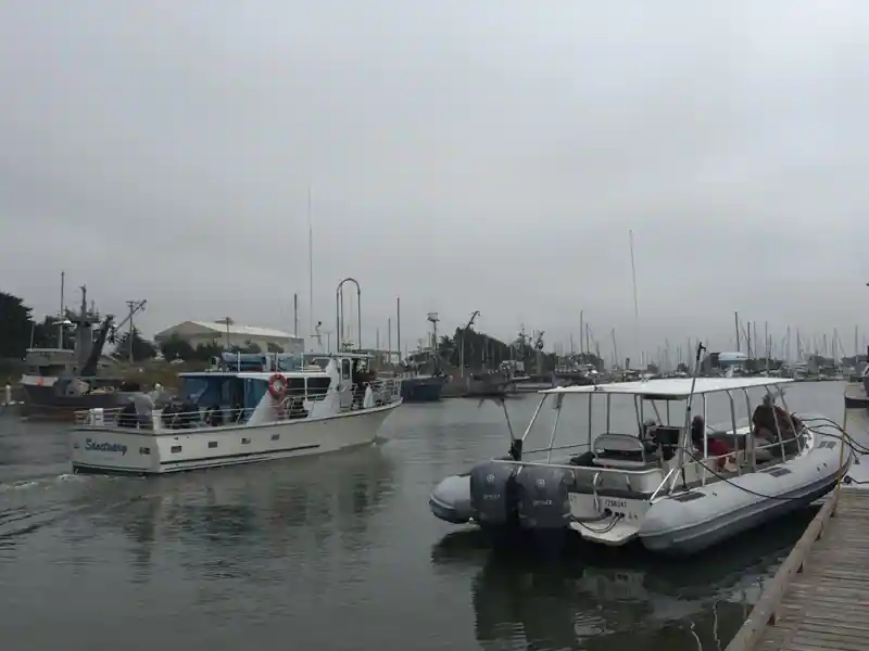 Ocean Spirit alongside Sanctuary at the dock
