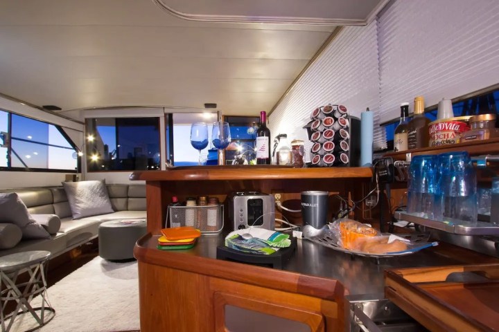 a kitchen with a table in a restaurant